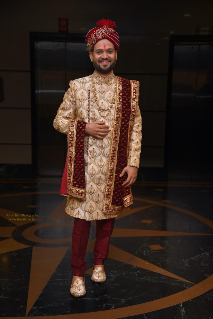 Manav Ethnic Happy Customer wearing a Royal Golden Sherwani