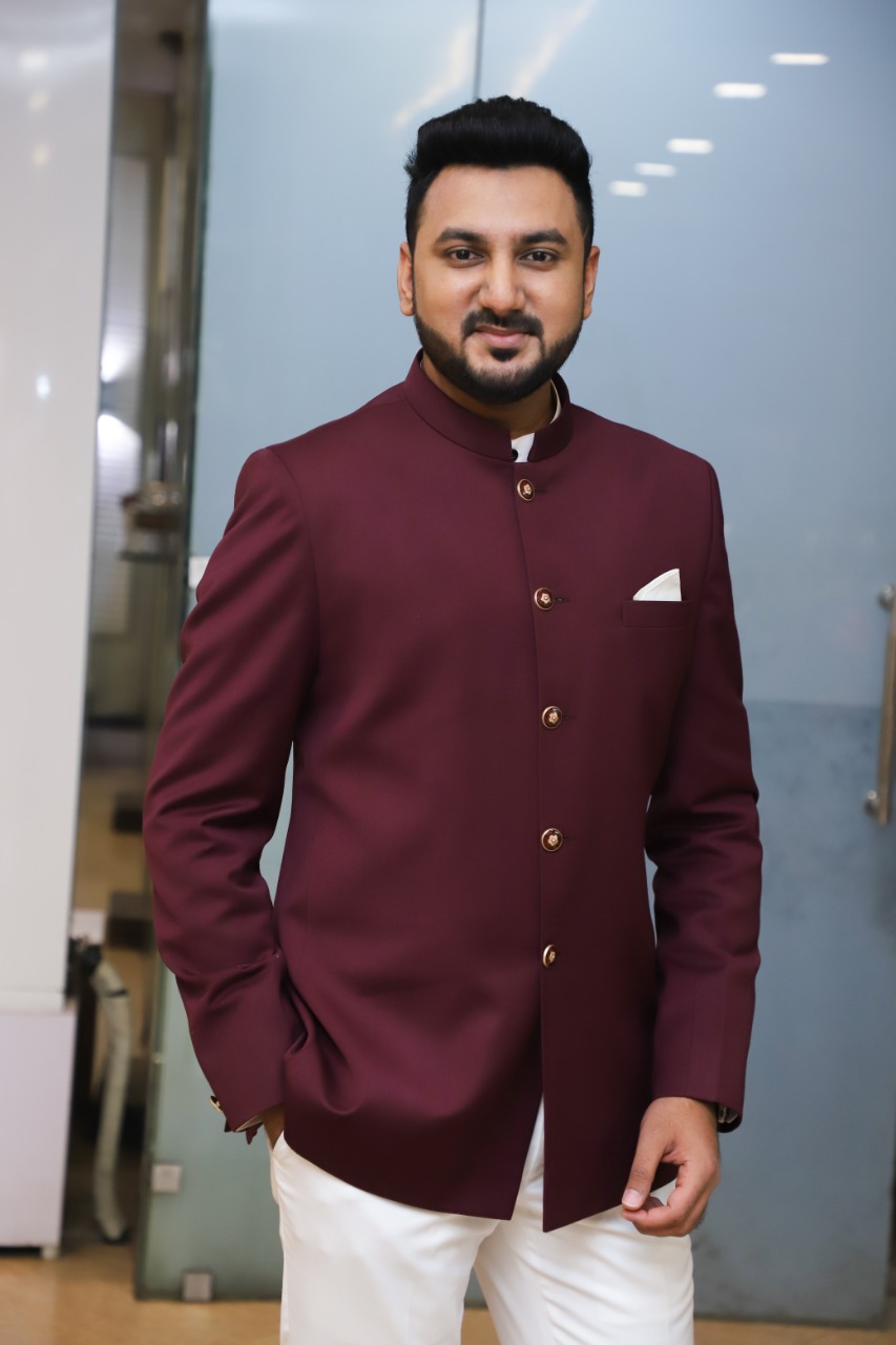 Manav Ethnic Happy Customer wearing a Wine Jodhpuri Suit