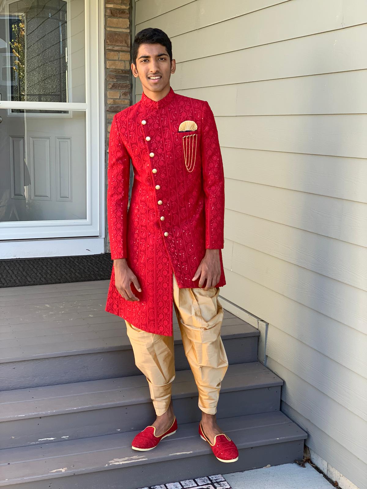Manav Ethnic Happy Customer wearing a Red Side Cut Indo Western