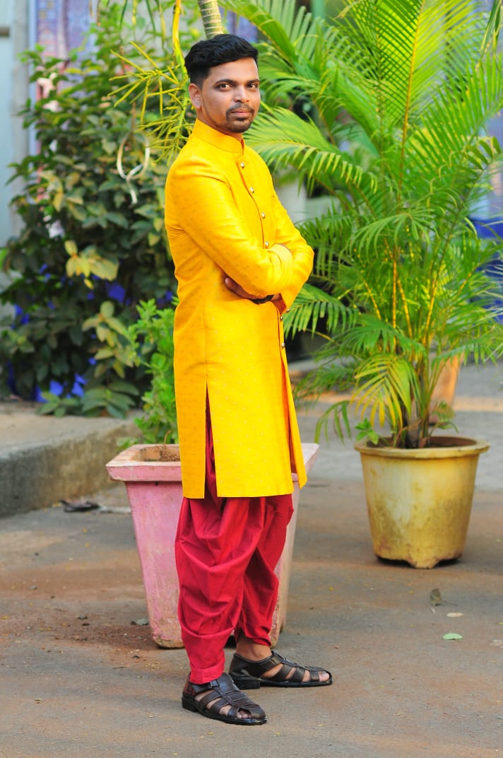Manav Ethnic Happy Customer wearing a Yellow Indo Western