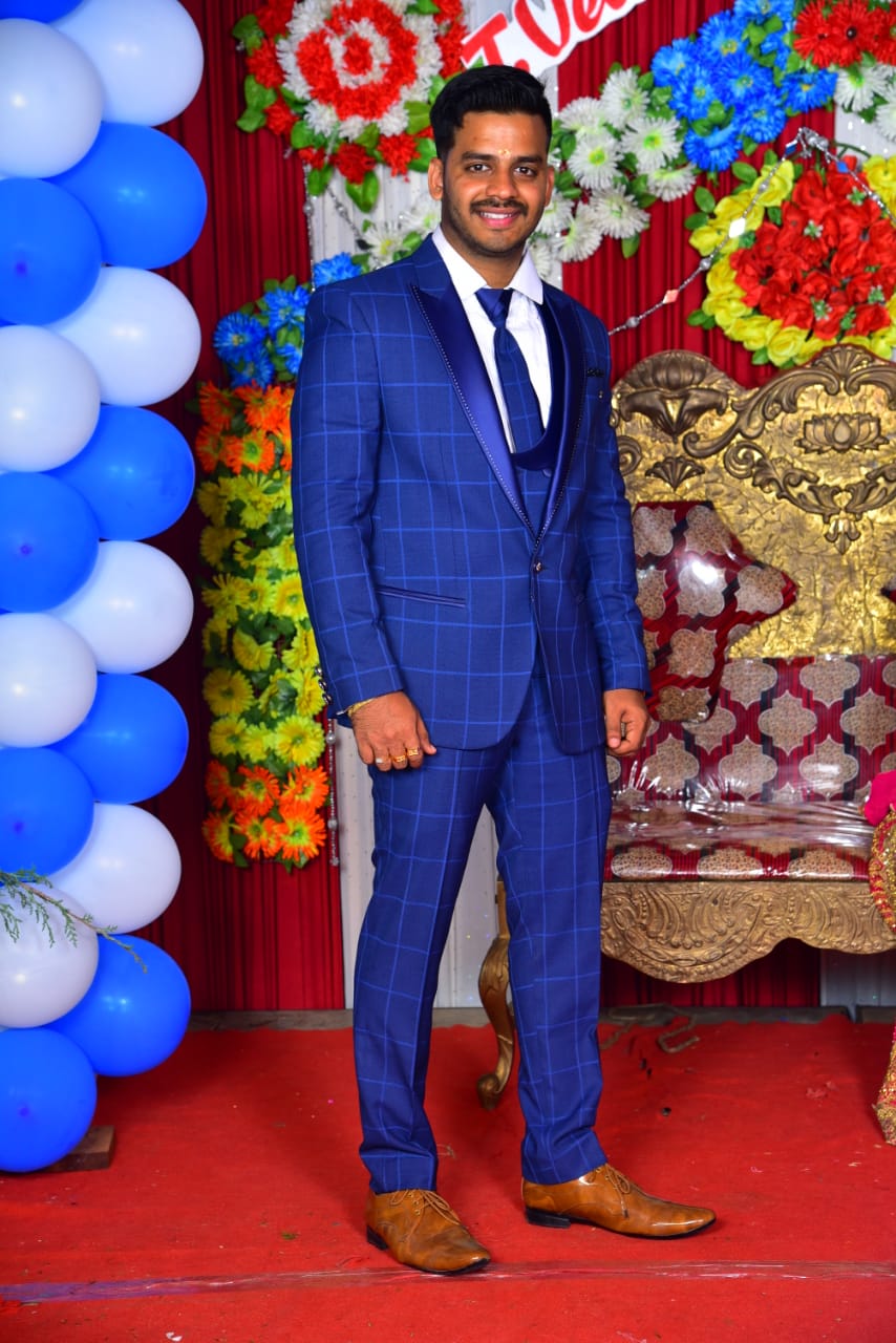 Manav Ethnic Happy Customer wearing a Blue Suit