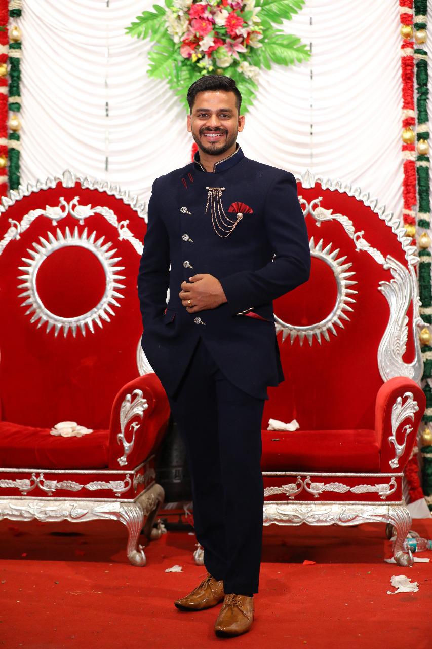 Manav Ethnic Happy Customer wearing a Dark Blue Designer Jodhpuri Suit